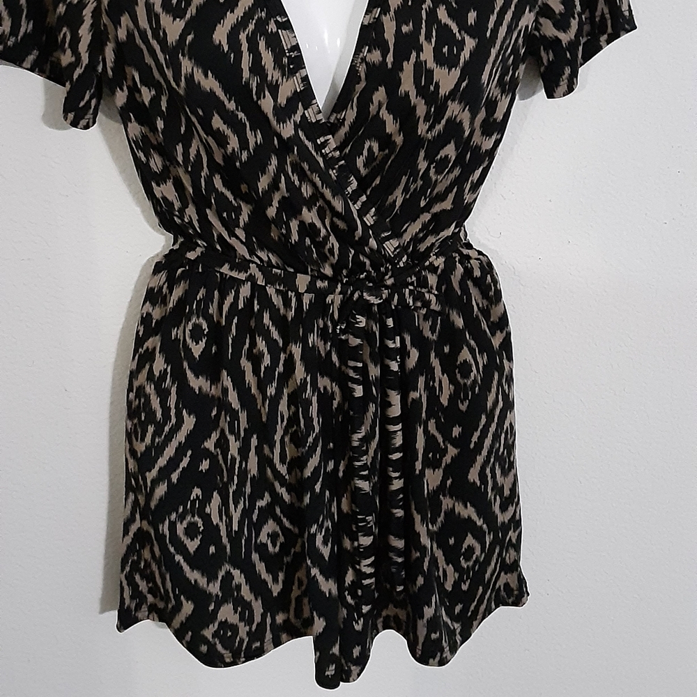 Black and tan Romper stretch material size medium